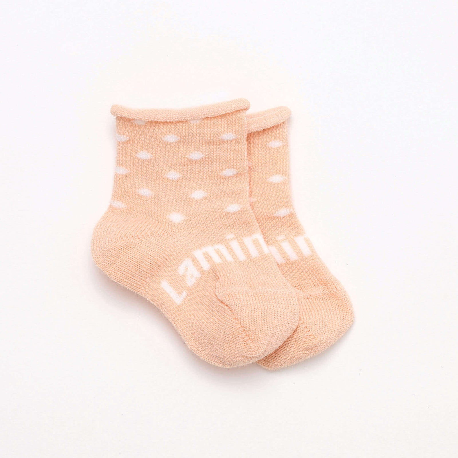 each with Natural spots merino wool crew socks for baby with a roll top