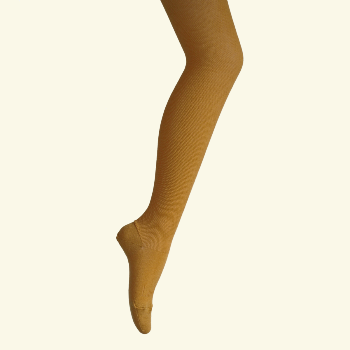 Merino Wool Textured Knit Tights in Tobacco, showcasing a deep mustard color and textured design, perfect for cool weather.