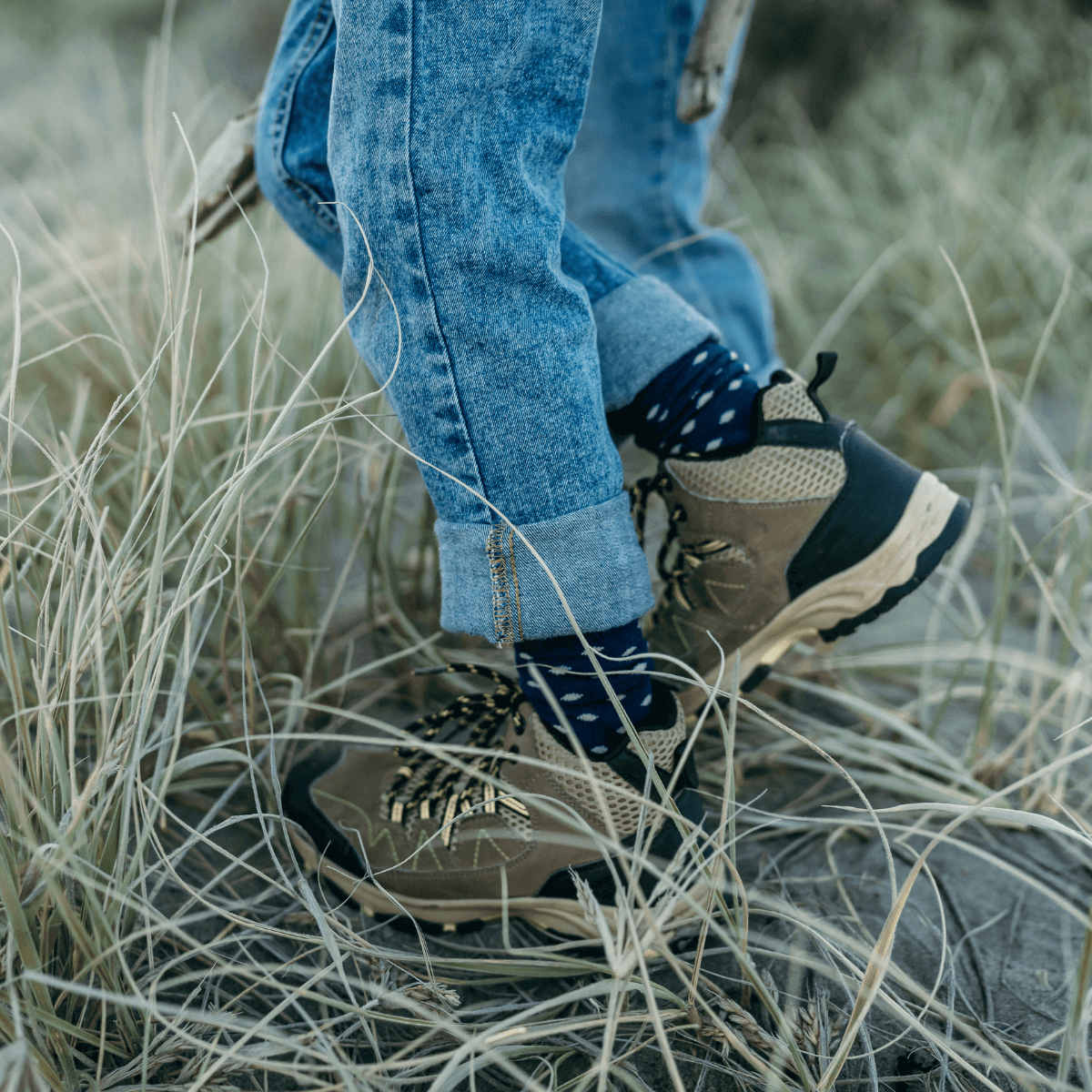 child wearing merino wool socks dark blue with beige spots aust