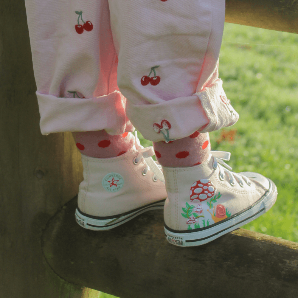 Merino Wool Crew Socks for Child in cherry with red spots, perfect for school and play.