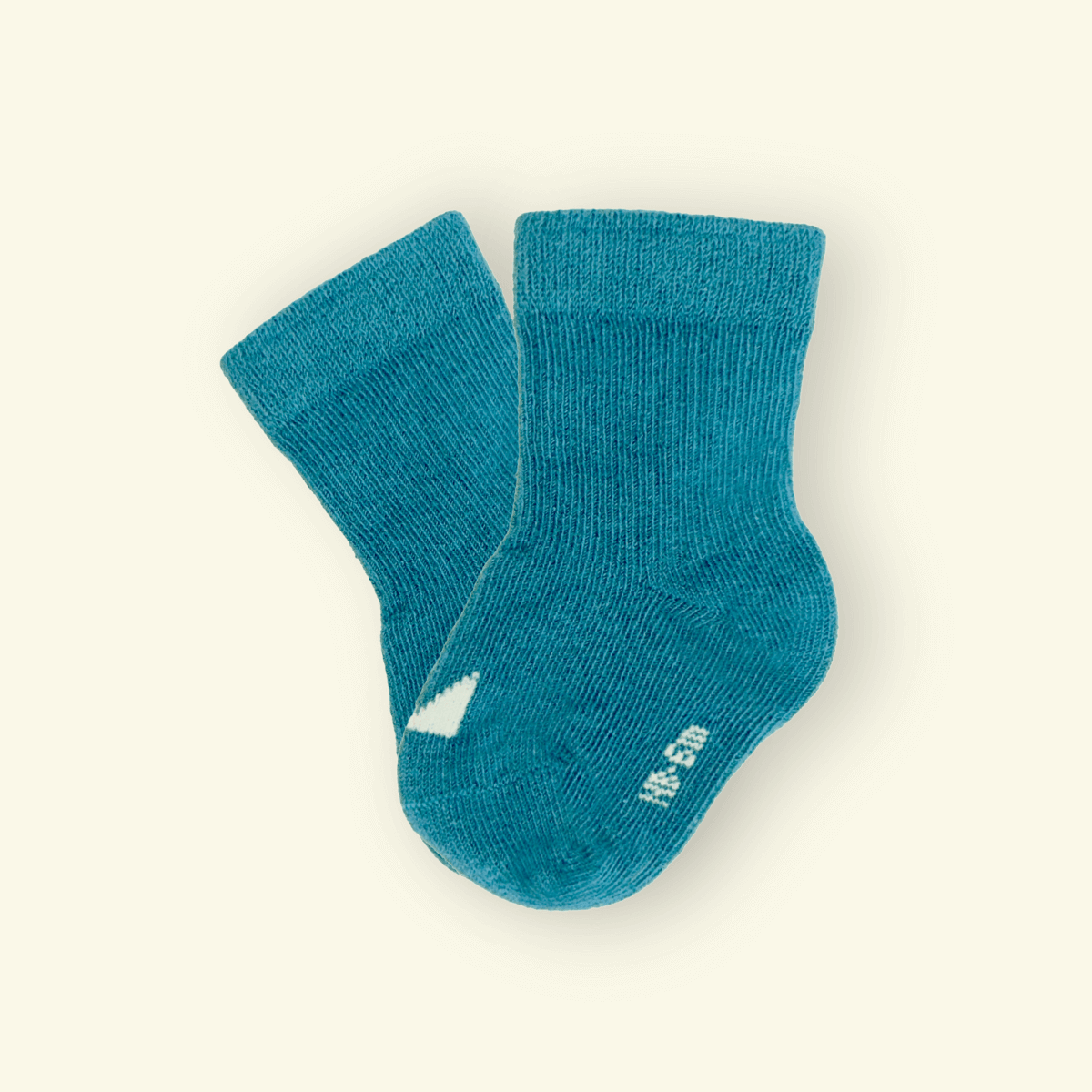 Organic Cotton Baby Socks in Dusty teal blue color, soft and snug for little adventures, featuring Mosey logo.