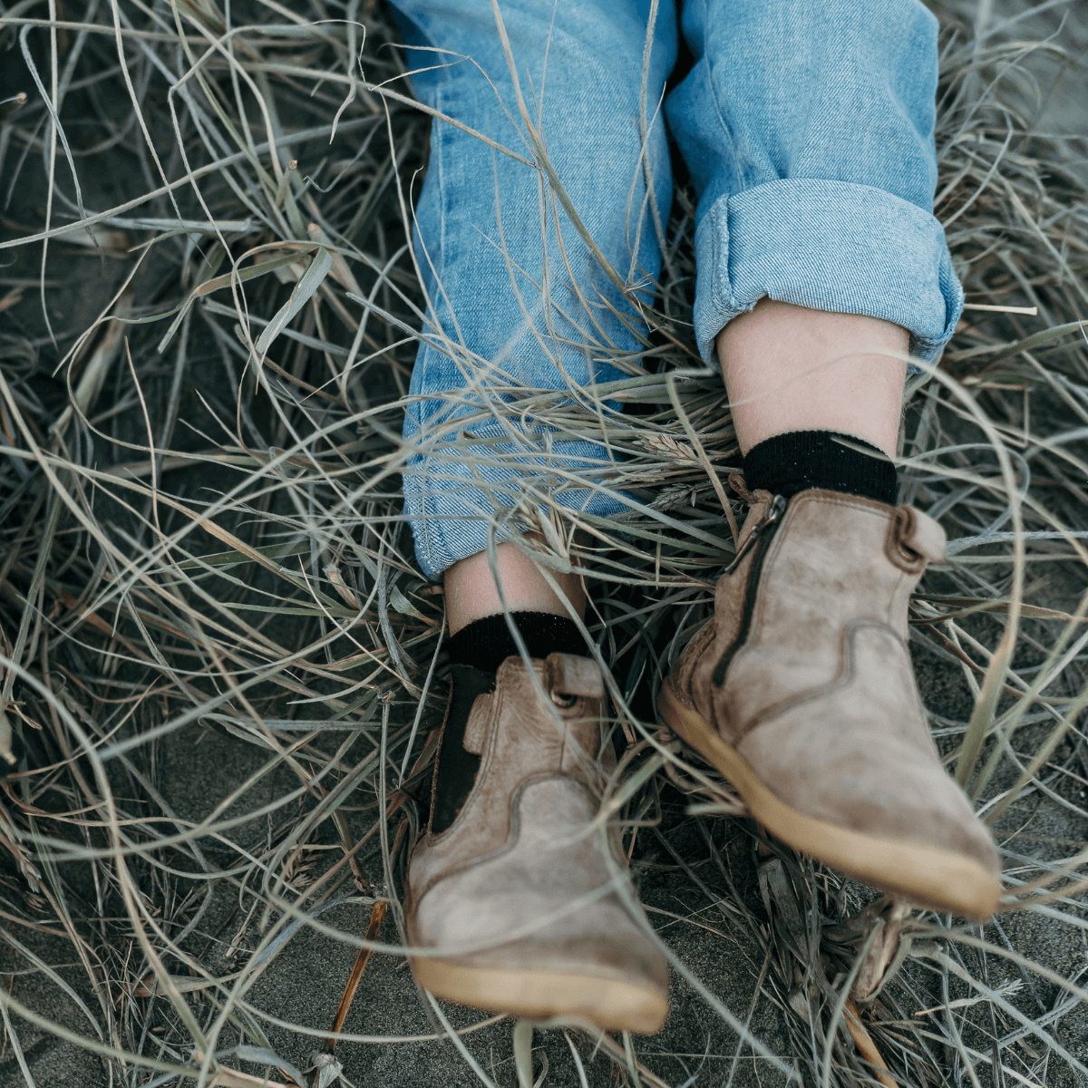 child wearing black ankle socks with boots aus