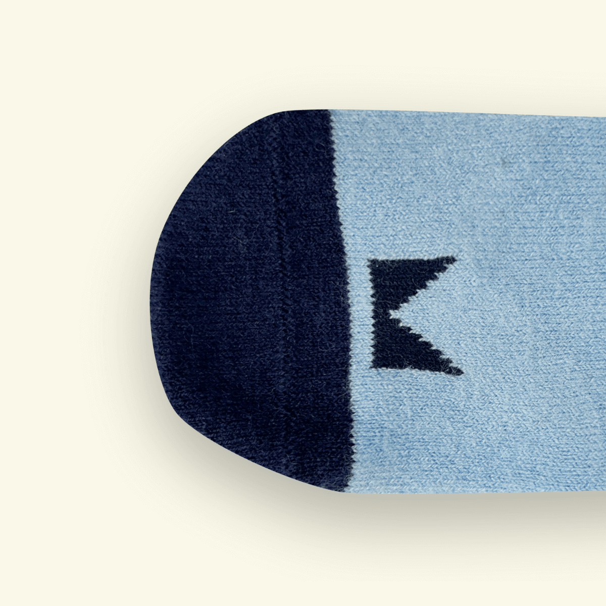 Merino Wool Baby Socks in Night, blue with black pattern, designed for comfort and warmth for infants.