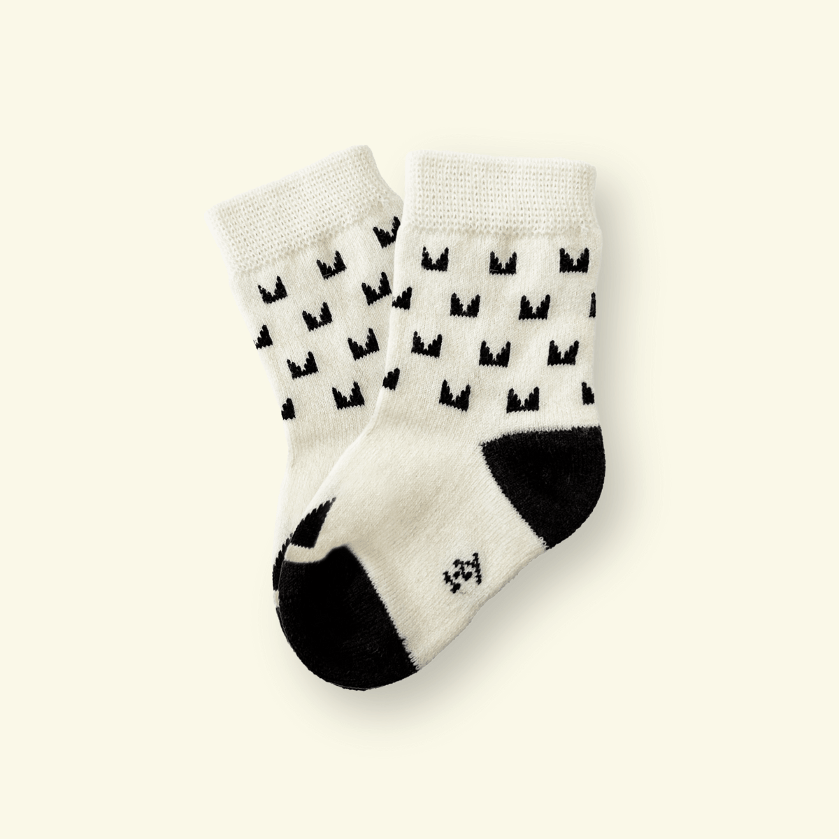 Merino Wool Baby Socks in Pixel design featuring a modern logo pattern, ideal for baby's comfort and style.