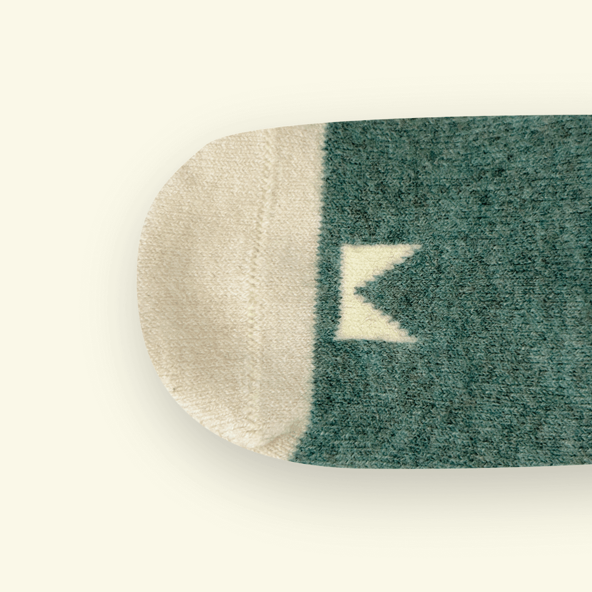 Merino Wool Baby Socks in green and cream color from Mosey, featuring a modern pattern and cozy fit.