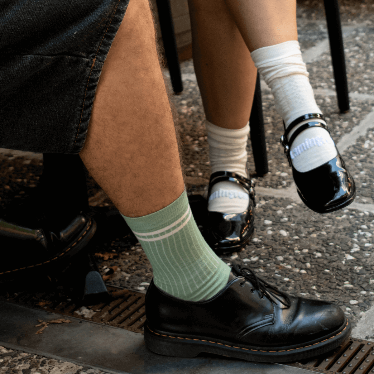 man wearing merino wool crew socks green stripes aus