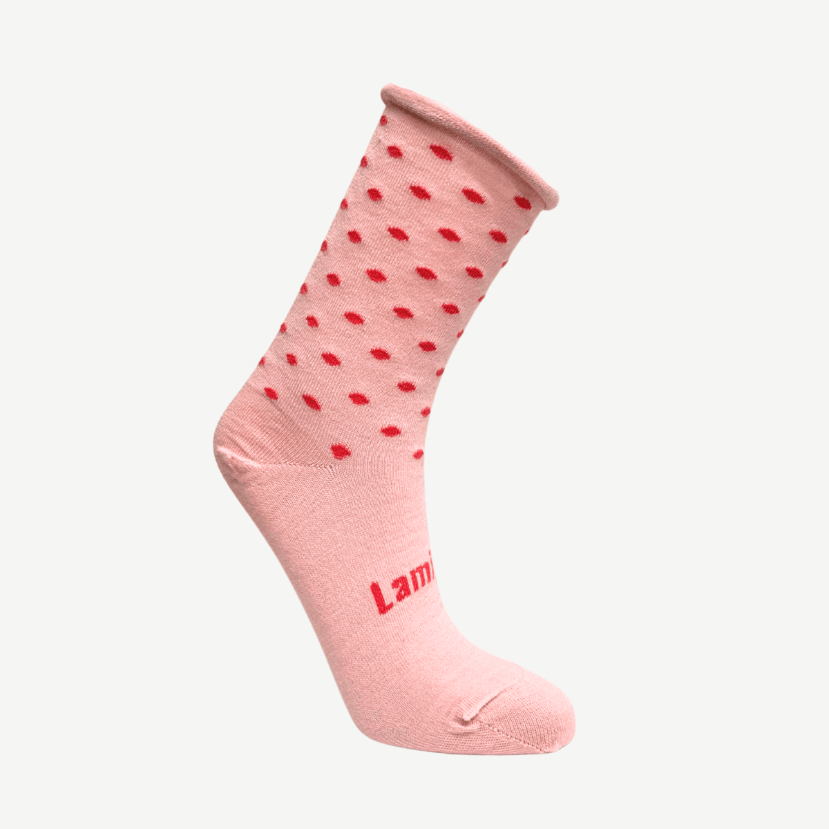 Merino Wool Crew Socks | WOMAN | Maggie in light pink with dark pink spots, supporting Breast Cancer Foundation NZ.