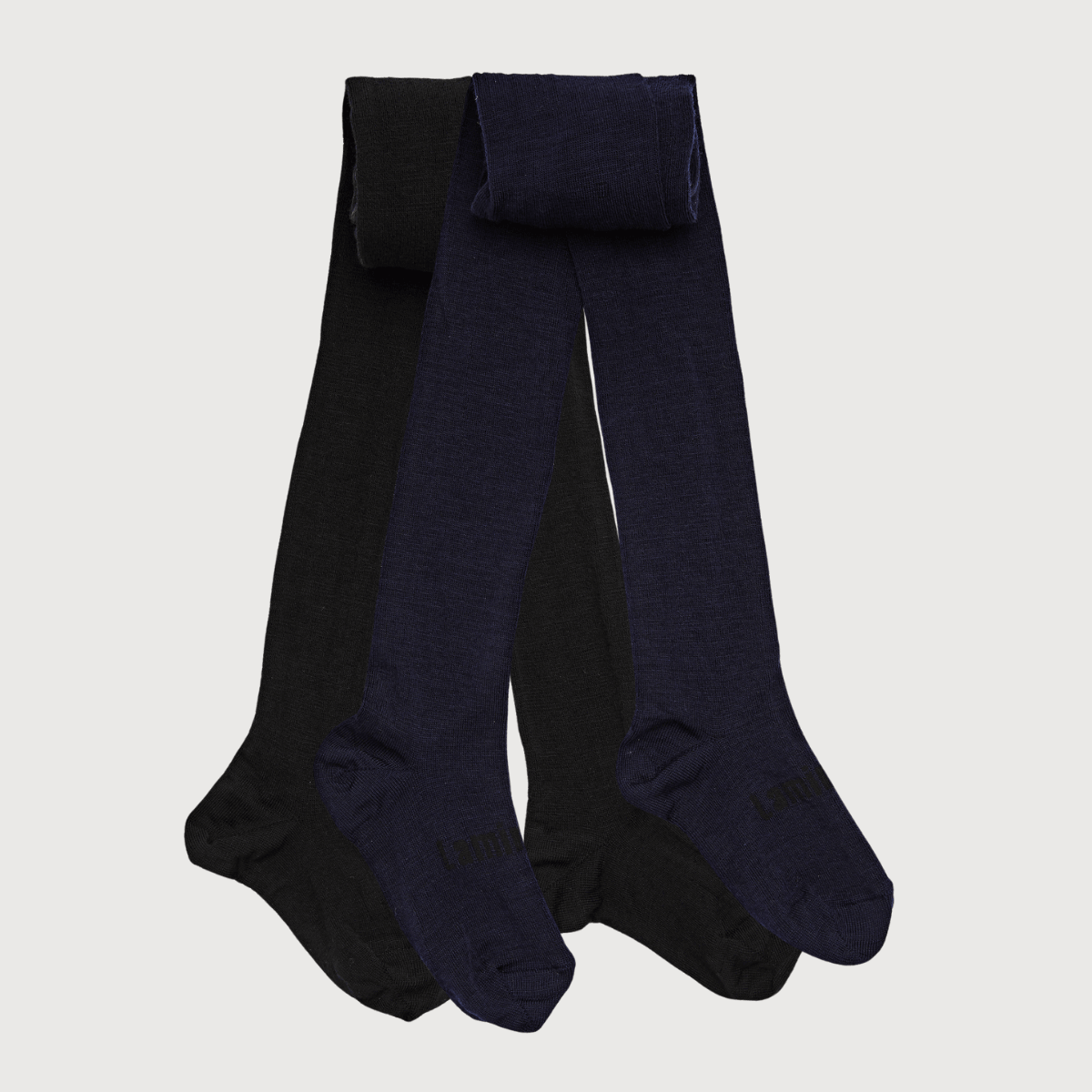 Merino Wool Flat Knit Essential Tights | CHILD | Packs in black and navy colors.