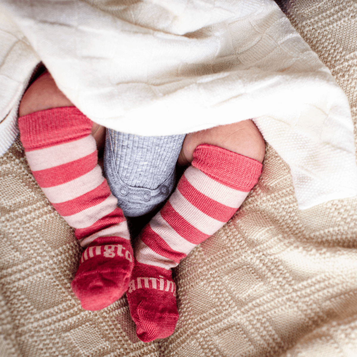 baby wearing merino wool pink knee-high socks aus
