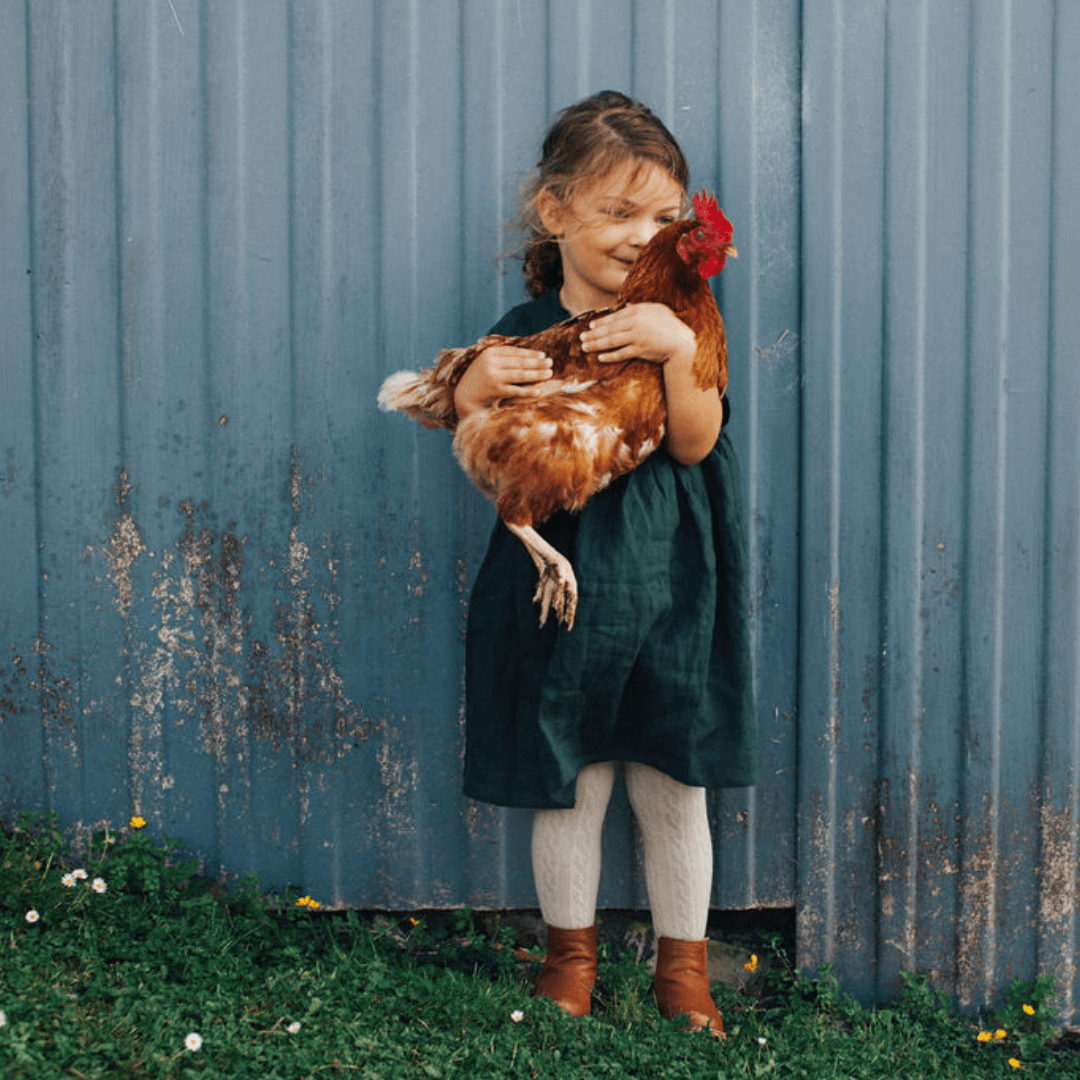 child wearing merino wool cable tights baby au