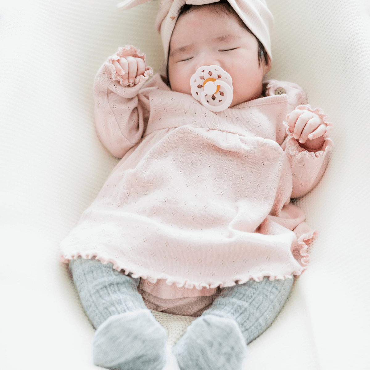 baby wearing grey merino wool tights au